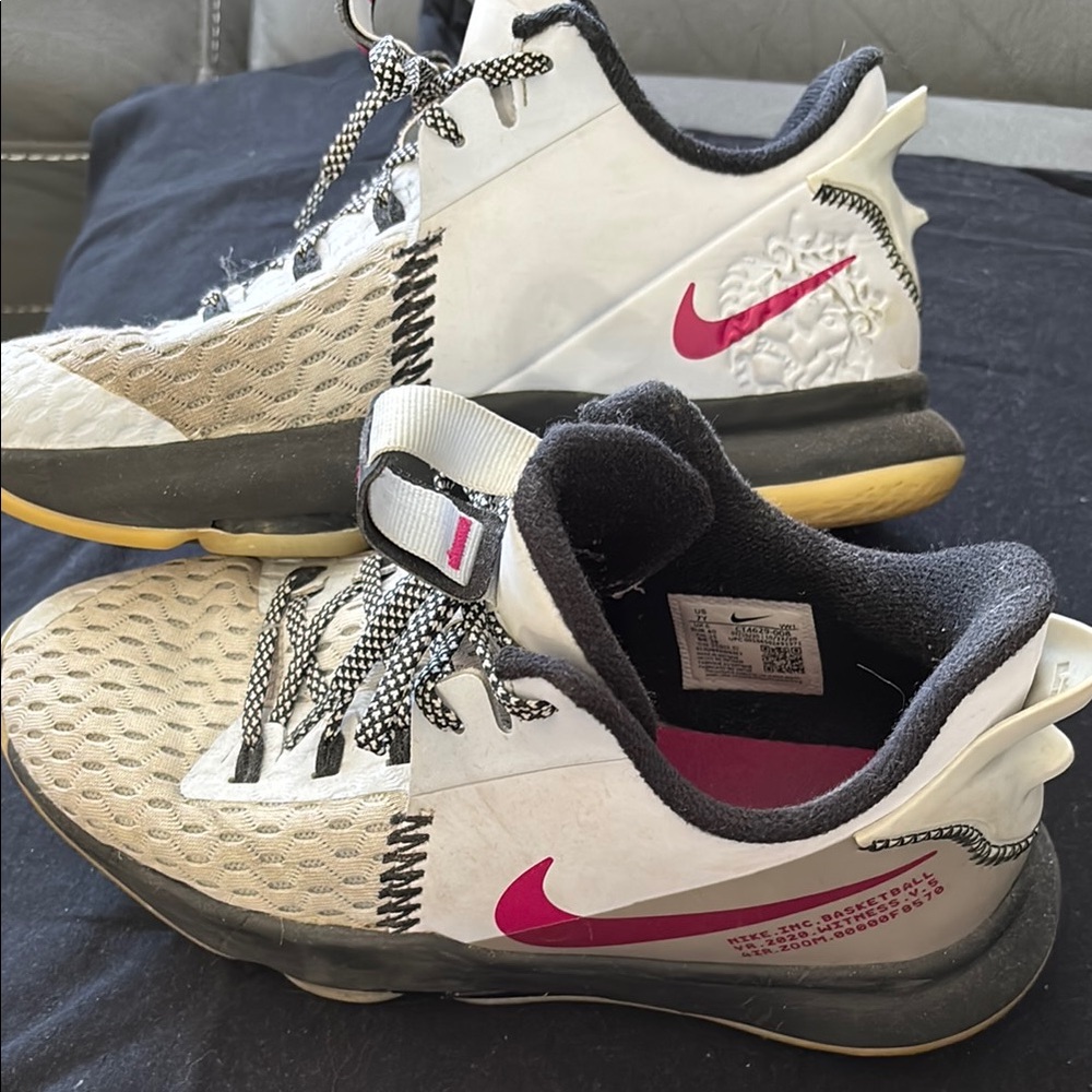 Nike White and Black Athletic Shoes with Pink Swoosh